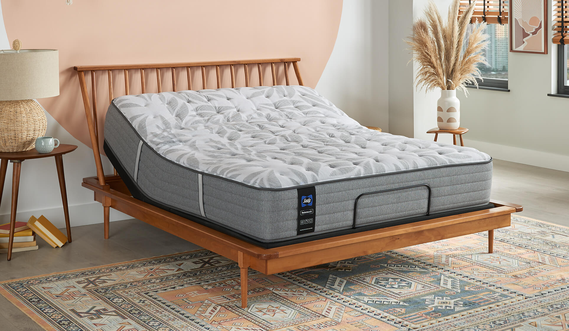 Queen size posturepedic mattress on adjustable base